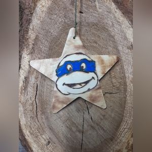 Woodburnt painted ornament